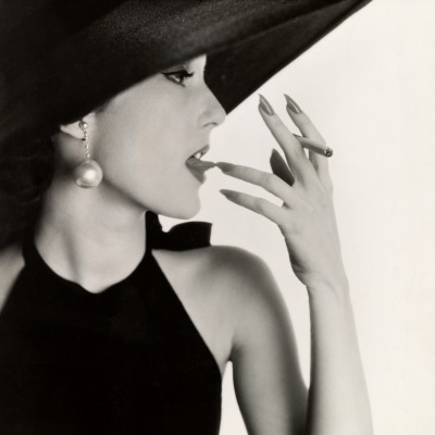 IRVING PENN - Girl with Tobacco on Tongue (Mary Jane Russell), New York, 1951, The Metropolitan Museum of Art, New York, Donation from the Irving Penn Foundation © Condé Nast