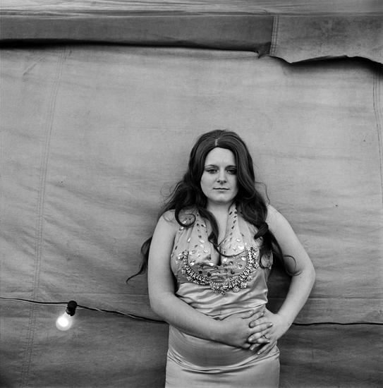 From “Carnival Strippers” 1972 - 1975. 11.5 x 17.5” silver gelatin print © Susan Meiselas courtesy Danziger Gallery