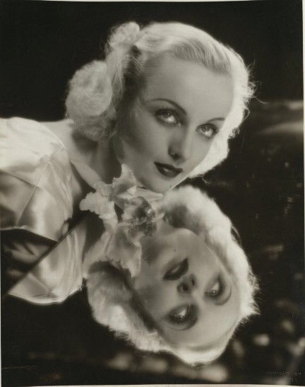 Otto Dyar. "Carole Lombard", c. 1933. Gelatin silver print, 13 7/8 × 10 1/2″ (35.2 × 26.7 cm)