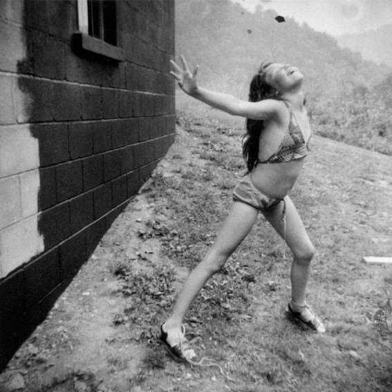 Wendy Ewald, Self-portrait reaching for the Red Star sky – Denise Dixon, from the “Portraits and Dreams” series, 1975-1982
