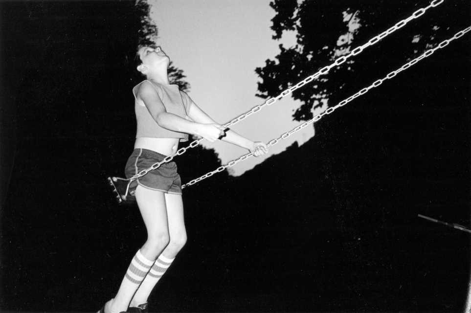 David on swing, West Virginia 1987, from the series "Moonshine", 44 x 29,5 cm, Archival Pigment Print, Ed. of 5 + 2 AP's
