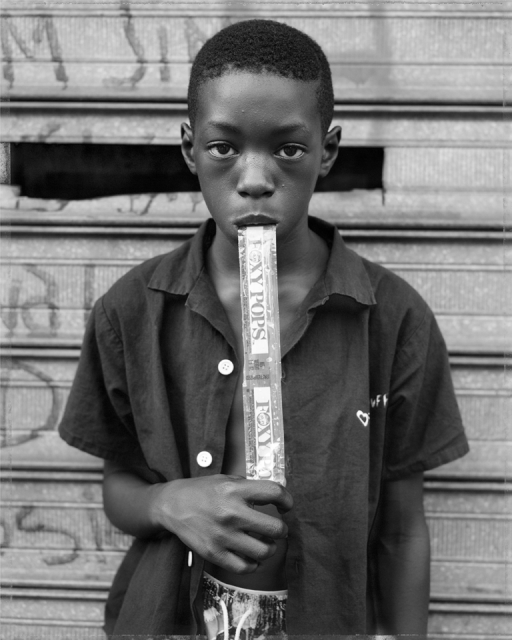 Dawoud Bey, A Boy Eating a Foxy Pop, Brooklyng, NY, &ç__; courtesy the artist and Stephen Daiter Gallery, Chicago; © Dawoud Bey