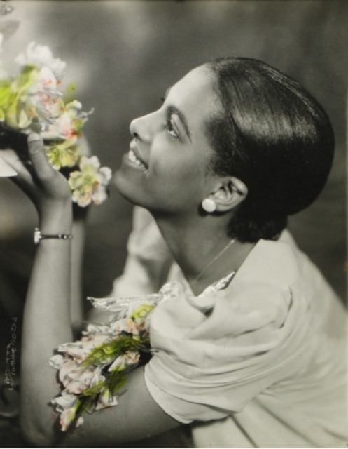James Van Der Zee, Lady with two corsages, 1935, gelatin silver print with hand coloring, 10 x 8 inches