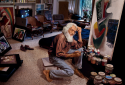 Steve McCurry, The late painter Maqbool Fida Husain, in his studio, Mumbai, India, 1993, Fujiflex Crystal Archive Supergloss Digital C-Print, 20 x 24 inches/50.8 x 61 cm © Steve McCurry