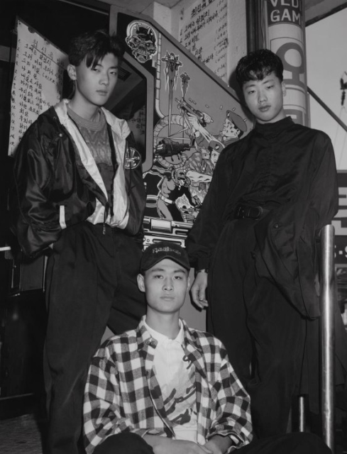 Three Boys in Front of Bogwang Karaoke, 1993, © Heinkuhn Oh, Courtesy of the Artist