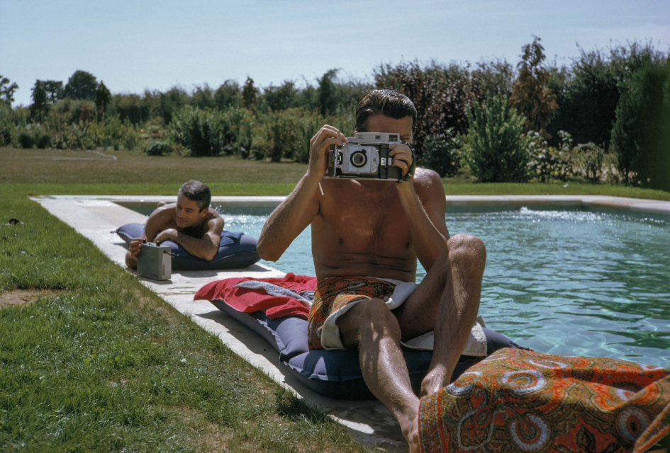 Givenchy with camera, South of France, 1961 ©Tony Vaccaro Courtesy of Monroe Gallery of Photography